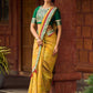 Exquisite Mustard Bandhani Print Saree with Green Benarasi Border & Tasseled Pallu with Hand Embroidered Mirror Work