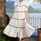 Graceful white cotton flared one piece dress highlighted with velvet lace