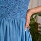 Flowy blue cotton dress with intricate block print and artistic detailing