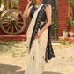Ivory cotton saree with bold block embroidered motifs and refined contrast detailing