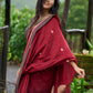 Artisanal maroon Jamdani saree elevated with zari-bordered detailing