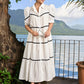 Graceful white cotton flared one piece dress highlighted with velvet lace