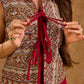 Rustic Beige Ethnic Print Cotton Sleeveless Cropped Jacket with Tassel Front Tie