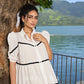 Graceful white cotton flared one piece dress highlighted with velvet lace