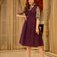 Playful purple cotton dress showcasing floral puff sleeves and box pleats released from the dart for soft volume and flow