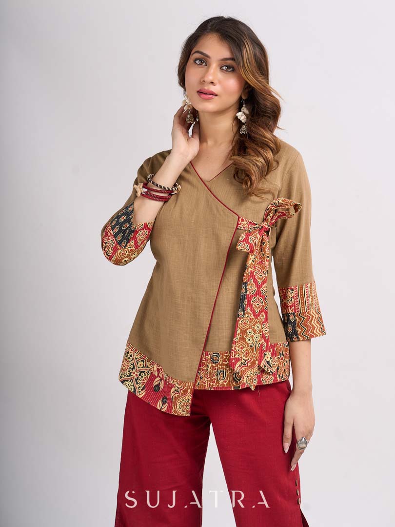 Beige Cotton Angrakha Style Top with Contrast Piping and Statement Tie Up Detailing