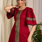 Radiant red cotton dress adorned with bold geometric block printed elegance