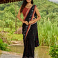 Heritage black cotton saree blending Jamdani-inspired weaves with Ajrakh elegance