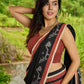 Heritage black cotton saree blending Jamdani-inspired weaves with Ajrakh elegance
