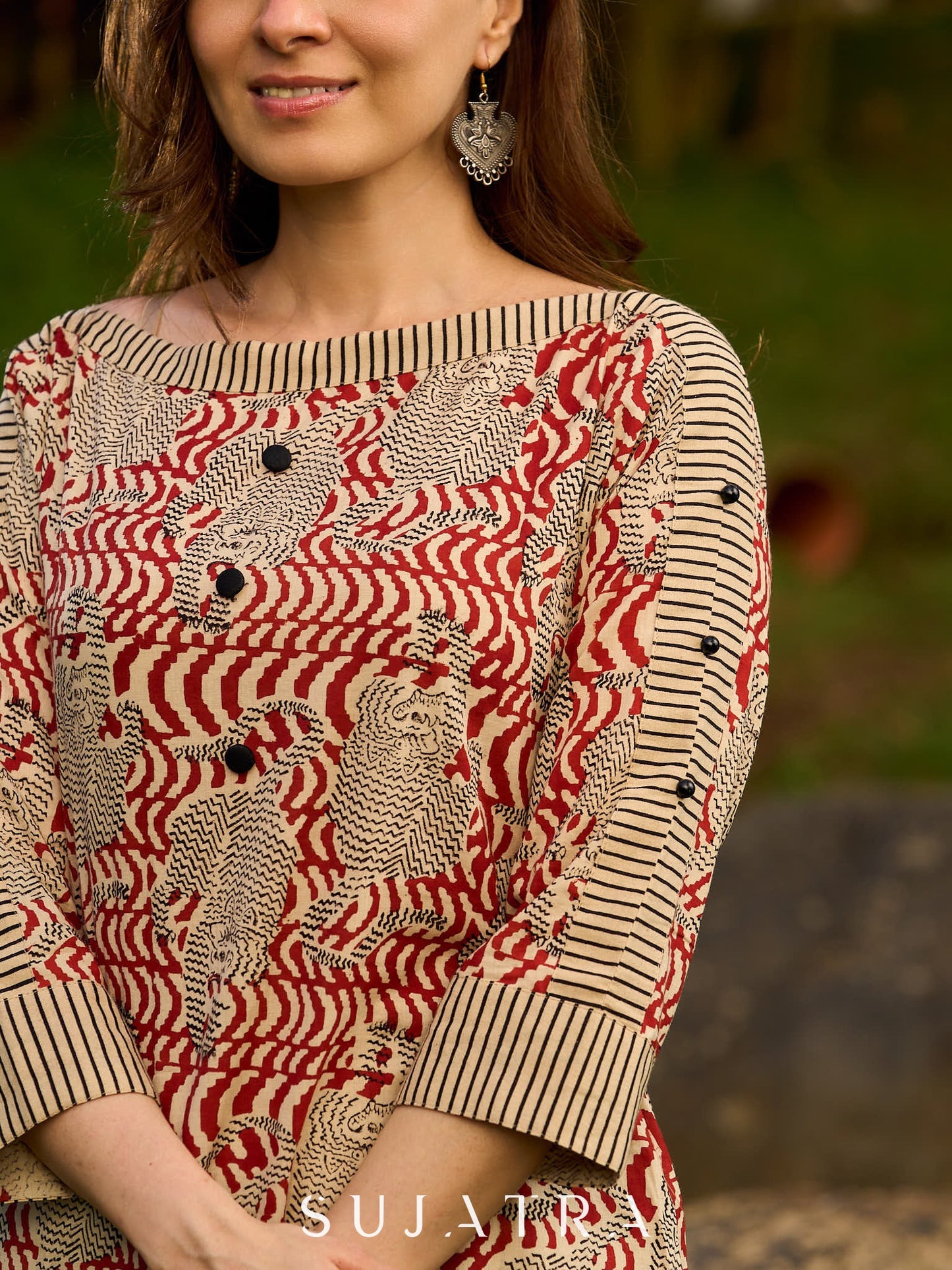 Artisanal Ajrakh Print Kurta with Animal Motifs, Boat Neckline, and Striped Highlights