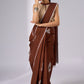 Minimalist brown cotton saree with sophisticated hand painting motifs