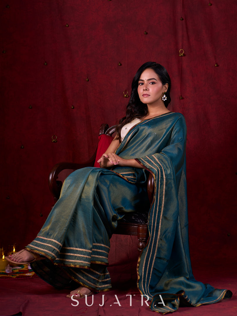 Teal Blue Tissue Saree with Zari Border & Minimal Detailing
