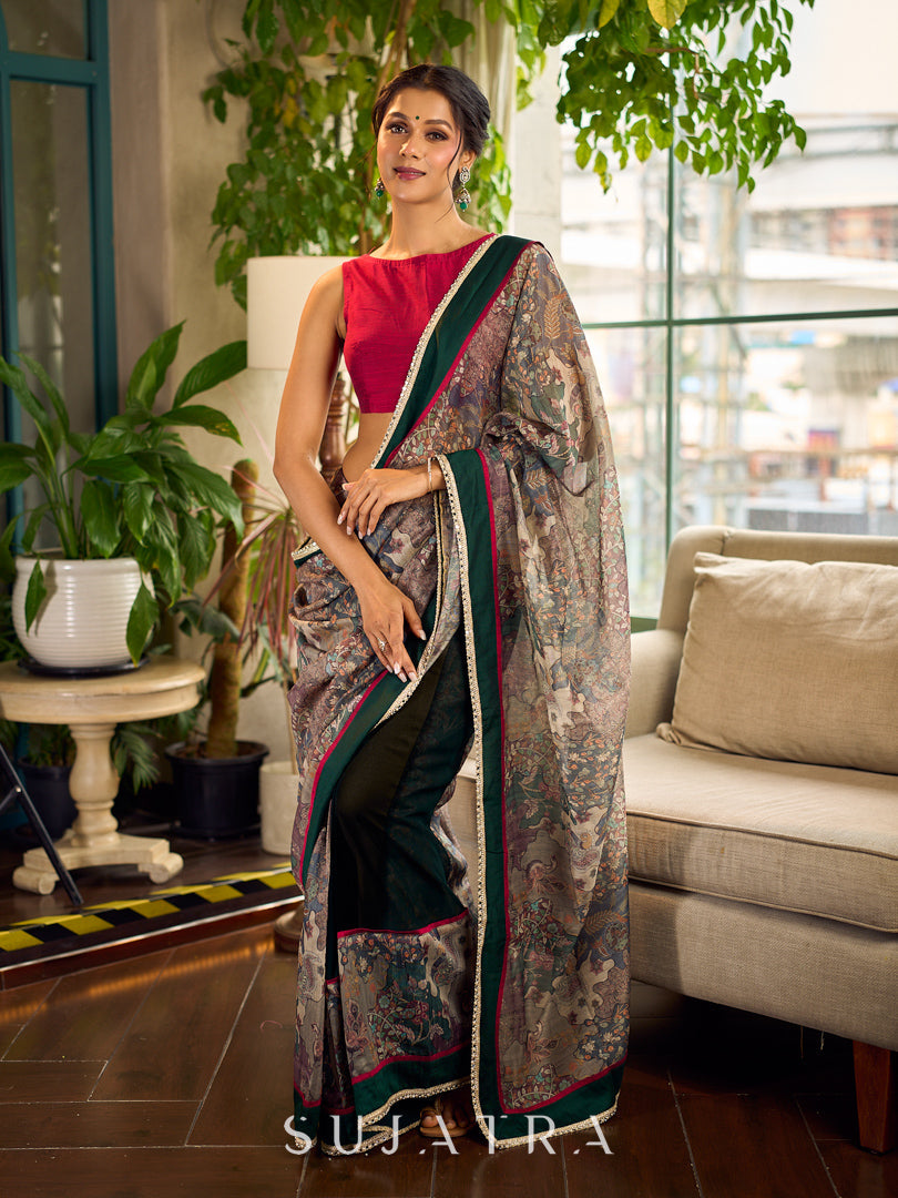 Regal Bottle Green Georgette Saree with Artistic Kalamkari Printed Pallu & Delicate Gold Lace Border