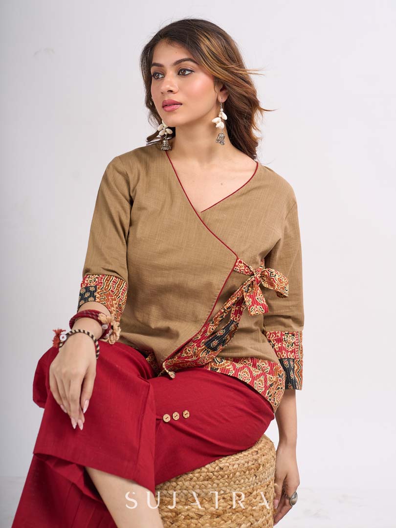 Beige Cotton Angrakha Style Top with Contrast Piping and Statement Tie Up Detailing