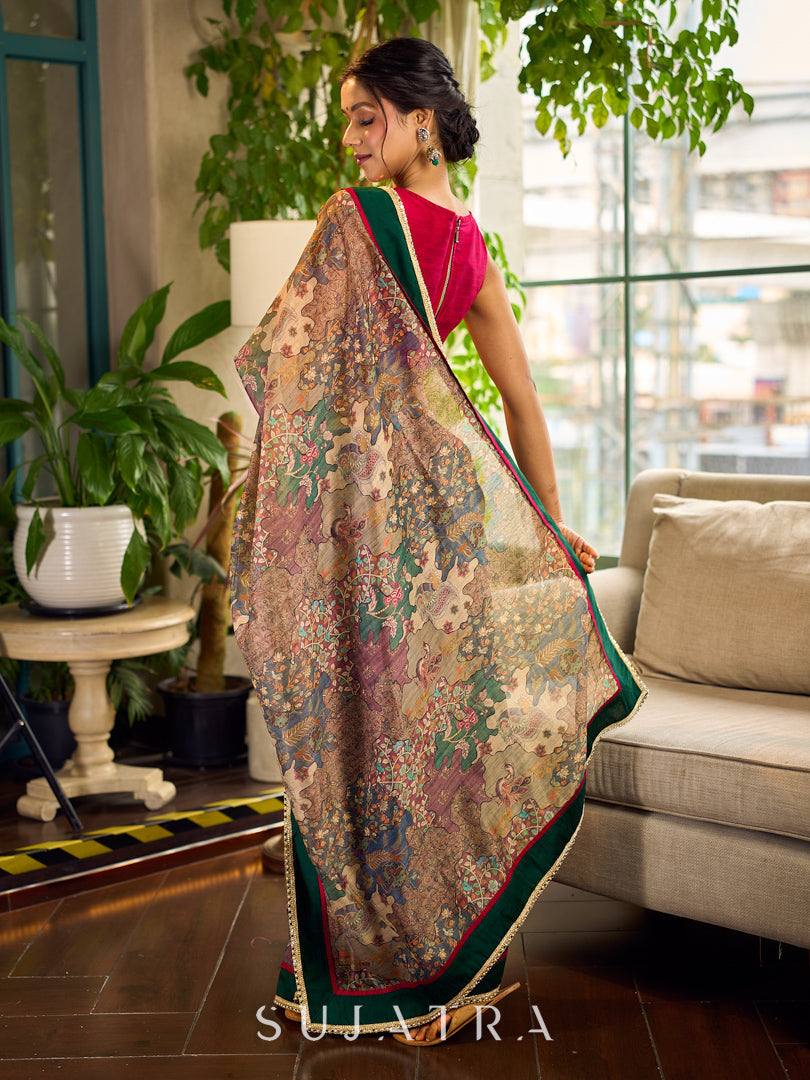 Regal Bottle Green Georgette Saree with Artistic Kalamkari Printed Pallu & Delicate Gold Lace Border