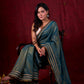Teal Blue Tissue Saree with Zari Border & Minimal Detailing