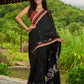 Heritage black cotton saree blending Jamdani-inspired weaves with Ajrakh elegance