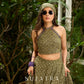 Vibrant Mehendi green and purple bandhani lehenga paired with a mirror work halter neck choli and matching dupatta.