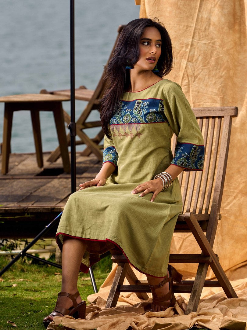 Sage Green Cotton Flared Dress with Contrast Ajrakh Yoke and Cuff Detailing featuring Hand Painting