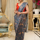 Exclusive floral printed saree with delicate hand embroidery and scalloped embroidered edges