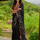 Heritage black cotton saree blending Jamdani-inspired weaves with Ajrakh elegance