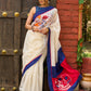 Hand-painted Pichwai inspired elegance on ivory chanderi saree