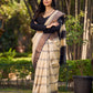 Classic Ivory and Brown Pure Tussar Silk  Block Printed Saree Accented with Subtle Stripes and Handcrafted Detailing