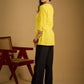 Traditional madhubani hand painting enhances this bright yellow cotton top.