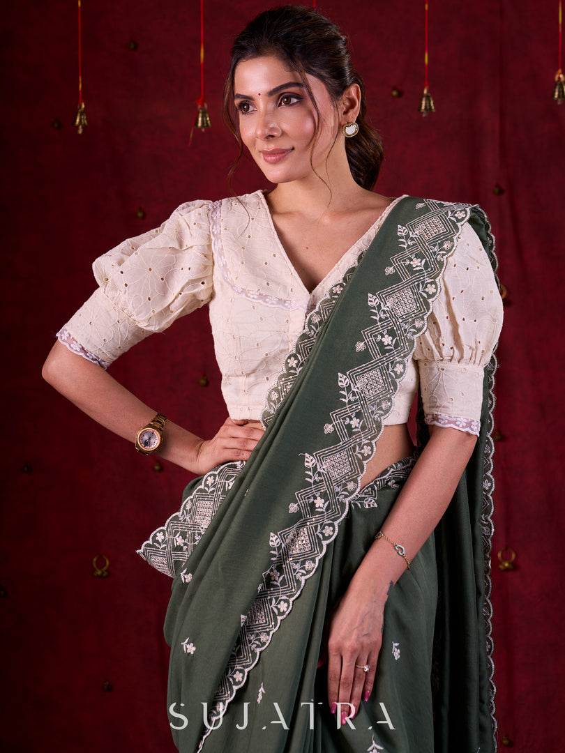Sage Elegance Chanderi Saree Featuring All-Over Embroidery & Exquisite Heavy Border