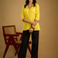 Traditional madhubani hand painting enhances this bright yellow cotton top.