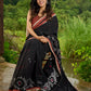 Heritage black cotton saree blending Jamdani-inspired weaves with Ajrakh elegance