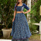 Modern folkloric layered indigo lehenga beautifully contrasted with a luminous full mirror work choli - Lehriya dupatta optional.