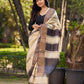 Classic Ivory and Brown Pure Tussar Silk  Block Printed Saree Accented with Subtle Stripes and Handcrafted Detailing