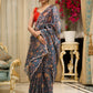 Exclusive floral printed saree with delicate hand embroidery and scalloped embroidered edges