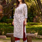 Elegant off-white and black kurta featuring Madhubani fish motifs with rich maroon accents