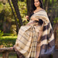 Classic Ivory and Brown Pure Tussar Silk  Block Printed Saree Accented with Subtle Stripes and Handcrafted Detailing