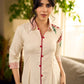 Off-white dandelion pleated shirt dress featuring dandelion placement block prints, checkered block-printed collar and cuffs, and red accents for a fresh, artisanal everyday look.