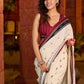 Classic ivory cotton saree adorned with Jamdani-inspired woven motifs