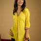 Traditional madhubani hand painting enhances this bright yellow cotton top.