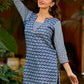 chic indigo short kurta featuring a floral stripe fusion and vibrant red piping.