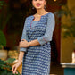 chic indigo short kurta featuring a floral stripe fusion and vibrant red piping.