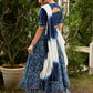 Modern folkloric layered indigo lehenga beautifully contrasted with a luminous full mirror work choli - Lehriya dupatta optional.