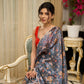 Exclusive floral printed saree with delicate hand embroidery and scalloped embroidered edges
