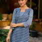 chic indigo short kurta featuring a floral stripe fusion and vibrant red piping.