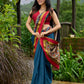 Elegant striped cotton saree in teal, enriched with hand-painted Kalamkari pallu