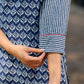 chic indigo short kurta featuring a floral stripe fusion and vibrant red piping.