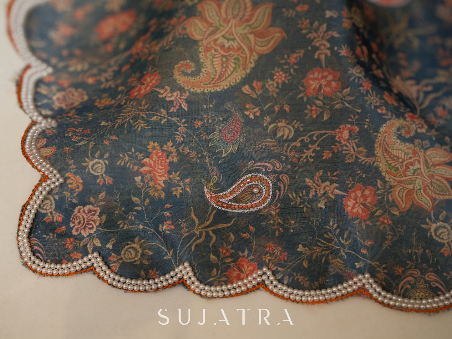 Exclusive floral printed saree with delicate hand embroidery and scalloped embroidered edges