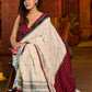 Classic ivory cotton saree adorned with Jamdani-inspired woven motifs