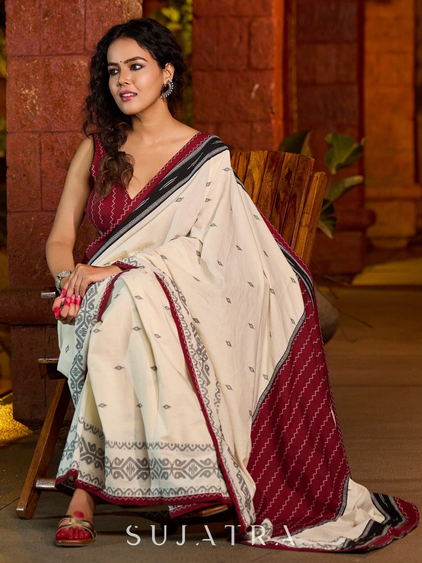 Classic ivory cotton saree adorned with Jamdani-inspired woven motifs