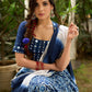 Modern folkloric layered indigo lehenga beautifully contrasted with a luminous full mirror work choli - Lehriya dupatta optional.